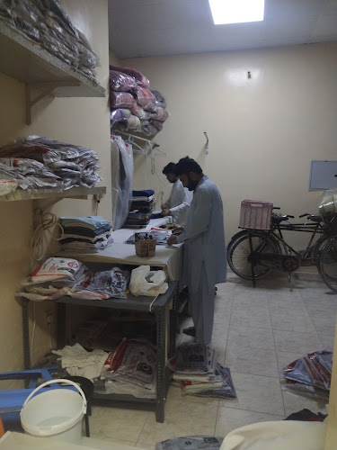 Al Jahraa Gar. Ironing in Industrial Area