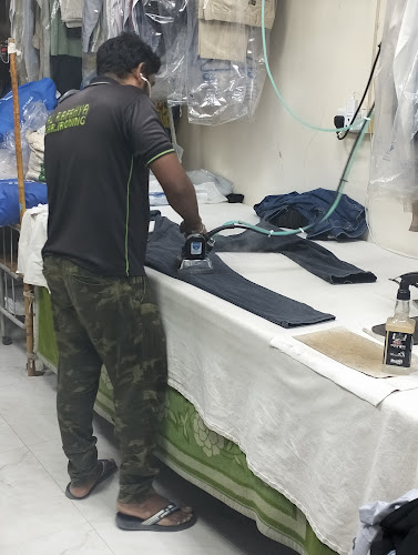 Al Rafahya Gar. Ironing in Hay Al Qasimiah