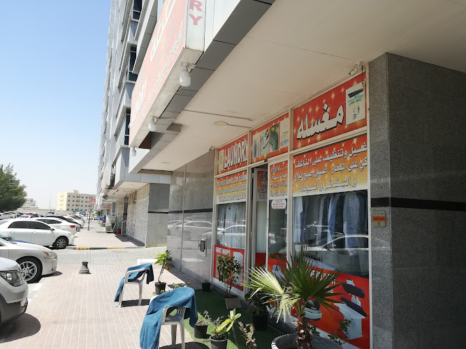 J6 Building Laundry Service in Al Hamidiya 1