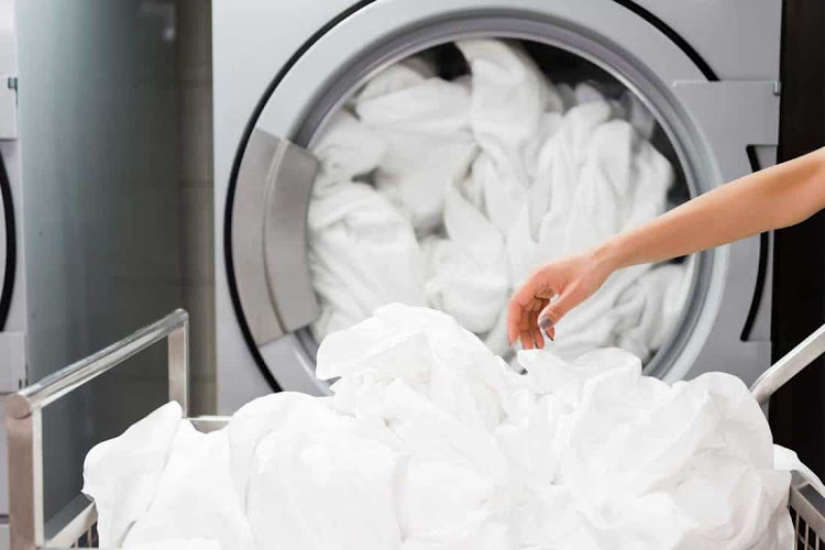 Pure Gold Automatic Laundry in Al Majaz