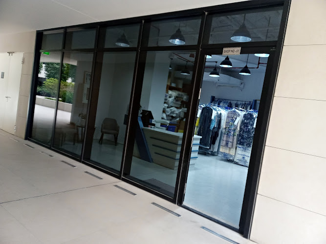 Queens Press Laundry in Al Raffa