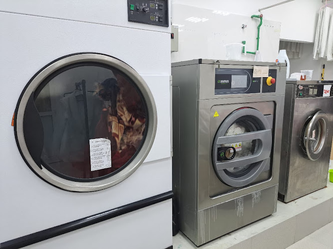 Spin & Clean Laundry Services in Khalifa City