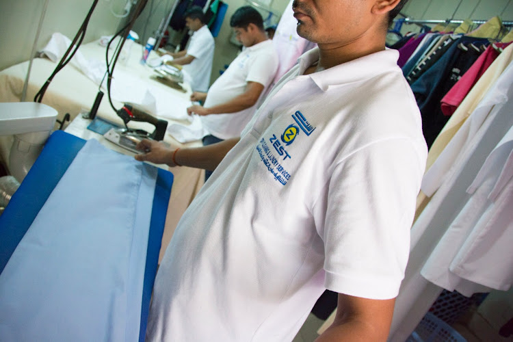 Zest dry cleaning & laundry services in Al Khalidiya District